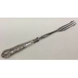 A Kings' pattern silver mounted pickle fork. Appro