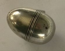 A rare silver vinaigrette in the form of an egg. Maker’s mark only to lid. London circa 1780. By