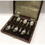 A boxed set of six silver coffee spoons. Sheffield