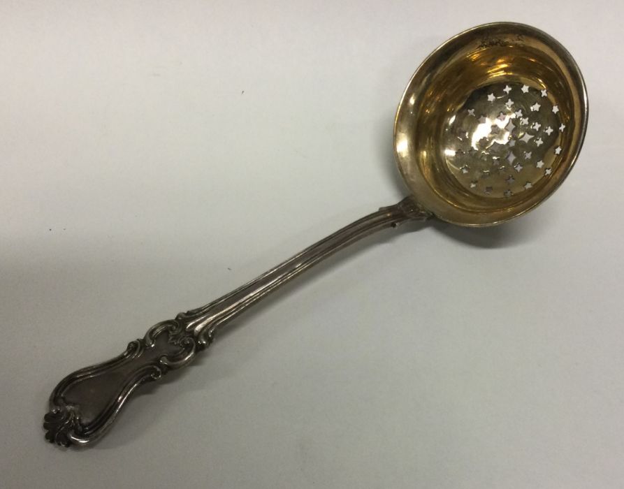 A heavy fine Victorian Russian silver sifter spoon. Approx. 60 grams. Est. £60 - £80.