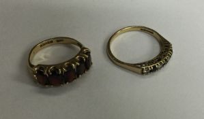 Two 9 carat gem set rings. Approx. 4 grams. Est. £