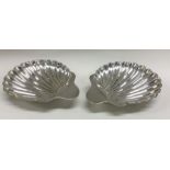 A pair of Victorian silver butter shells. London 1885. By Josiah Williams. Approx. 115 grams.