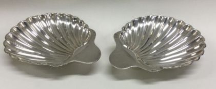A pair of Victorian silver butter shells. London 1885. By Josiah Williams. Approx. 115 grams.