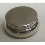 A silver box with lift off lid. Birmingham 1947. Approx. 12 grams. Est. £20 - £30.