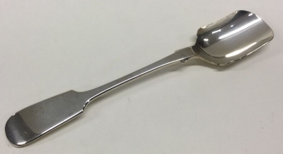 A fiddle pattern silver cheese scoop. Sheffield. A