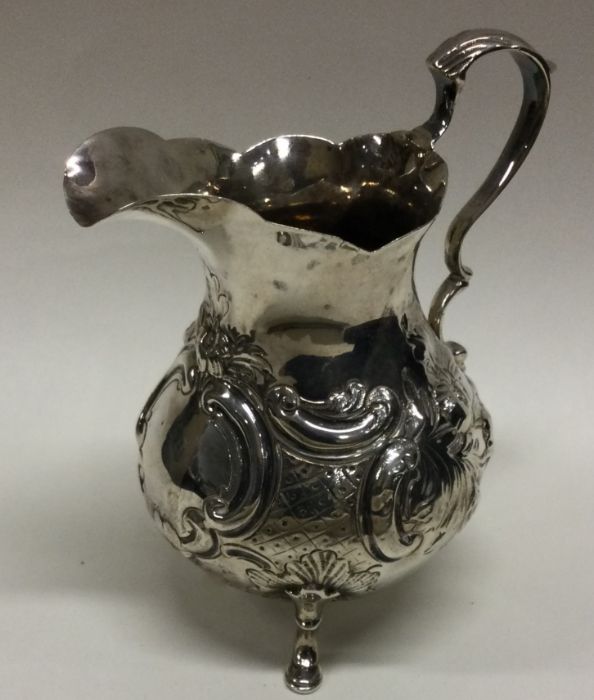 A fine Victorian silver chased jug London 1853. By Jacob Wintle. Approx. 149 grams. Est. £120 - £