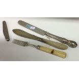 A group of silver mounted butter knives etc. Appro