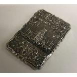 A Victorian silver castle top card case depicting Windsor Castle. Birmingham 1851. By Edward