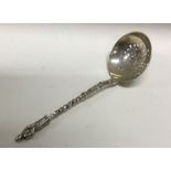 An Apostle design silver sifter spoon. Sheffield 1921. By Harrison Brothers. Approx. 29 grams.