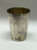 An early 18th/19th Century Continental silver beaker. Approx. 17 grams. Est. £60 – £80.