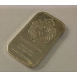 A one ounce silver ingot. Approx. 31 grams. Est. £30 - £50.