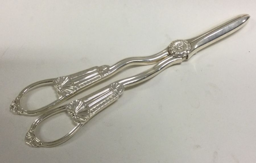 A fine quality pair of Victorian silver grape scissors/ ice tongs. London 1893. By John Aldwinckle