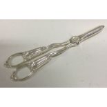 A fine quality pair of Victorian silver grape scissors/ ice tongs. London 1893. By John Aldwinckle