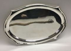 CHESTER: A large shaped silver dressing table tray