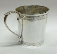 A fine engraved silver christening mug. Sheffield 1928. By James Dixon and Sons. Approx. 136