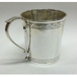A fine engraved silver christening mug. Sheffield 1928. By James Dixon and Sons. Approx. 136