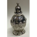 A good chased Victorian silver caster. London 1892. By William Comyns. Approx. 78 grams. Est. £