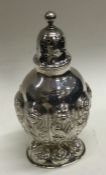 A good chased Victorian silver caster. London 1892. By William Comyns. Approx. 78 grams. Est. £