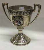 A silver and enamelled trophy cup. Birmingham 1941. By Fattorini and Sons. Approx. 137 grams.
