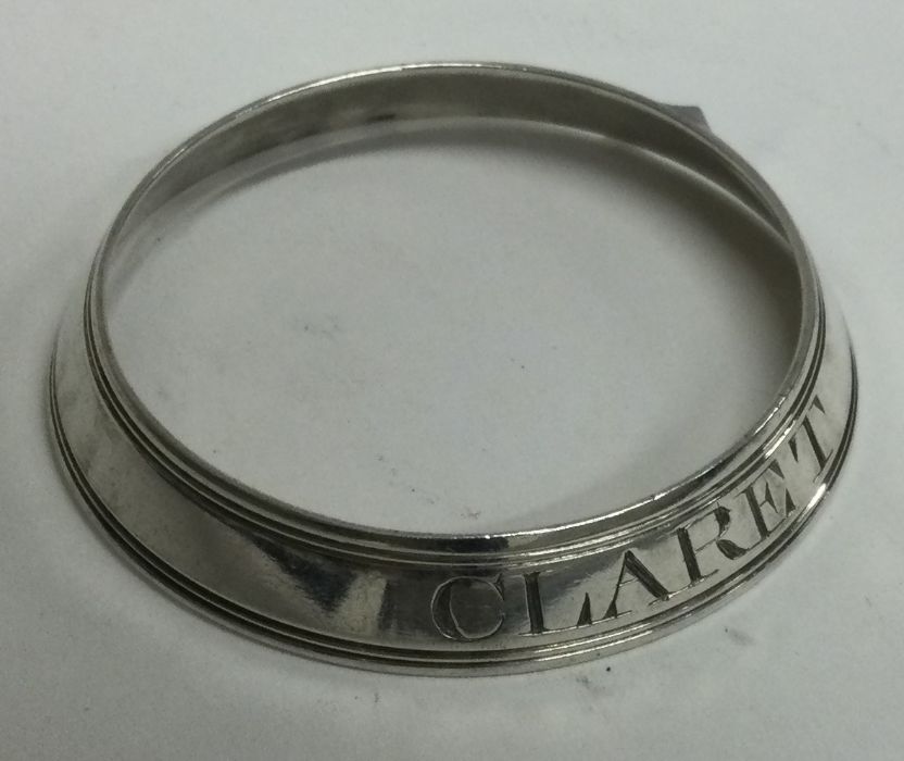 A George III silver wine collar for ‘Claret’. London 1813. By Robert Barker. Approx. 17 grams.