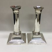 An 18th Century George III silver pair of candlesticks. Sheffield 1788. By John Green, Roberts,
