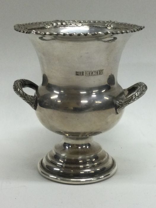 A silver Warwick style vase. Birmingham 1973. By David Hollander and Sons. Approx. 89 grams. Est. £