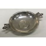 A silver wine taster/bleeding bowl. London 1935. By R E Stone and Asprey & Co. Approx. 91 grams.