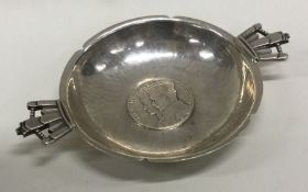 A silver wine taster/bleeding bowl. London 1935. By R E Stone and Asprey & Co. Approx. 91 grams.