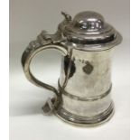 An 18th Century silver lidded tankard. London 1754. By William Shaw and William Priest. Approx.