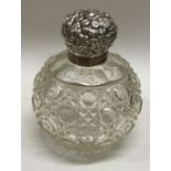 CHESTER: A silver and glass chased scent bottle. 1906. By George Nathan and Ridley Hayes. Est. £50 -