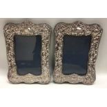 A pair of embossed silver picture frames. London m