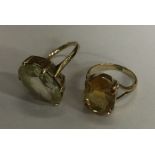 Two large lady's single stone rings. Approx. 8.9 g