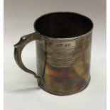 A heavy silver christening cup of barrel form. Lon