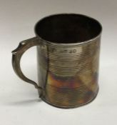 A heavy silver christening cup of barrel form. Lon