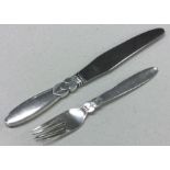 GEORG JENSEN: A heavy silver knife and fork of typ