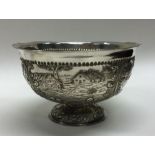 A Victorian silver Dutch chased bowl bearing import marks. London 1903. By Alfred Lewis. Approx.