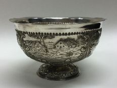 A Victorian silver Dutch chased bowl bearing import marks. London 1903. By Alfred Lewis. Approx.