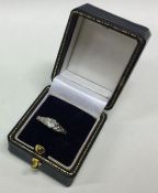 A small diamond single stone ring in 18 carat gold