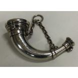 A Victorian silver vinaigrette in the form of a horn on suspension chain. London 1873. By Sampson