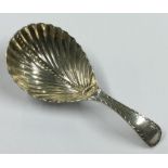 A George III fluted silver caddy spoon. London 1804. By Robert Garrard. Approx. 11 grams. Est. £50 -