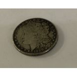 An old silver coin. Approx. 25 grams. Est. £20 - £30.