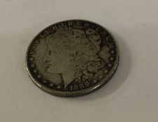 An old silver coin. Approx. 25 grams. Est. £20 - £30.