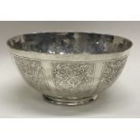 An early 19th Century Chinese silver bowl engraved with trees and temples. Approx. 233 grams.