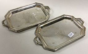 A pair of silver trays. Approx. 101 grams. Est. £100 - £150.
