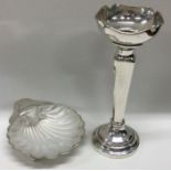 A silver butter shell together with a spill vase.