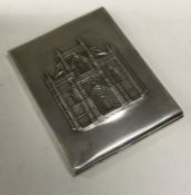 A heavy Continental silver cigarette case embossed with a castle. Approx.125 grams. Est. £120 - £