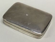 A large English silver hinged pill box. Marked to base. Approx. 61 grams. Est. £50 - £80.