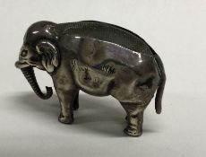 A silver pin cushion in the form of an elephant. Birmingham. Approx.30 grams. Est. £100 - £150.