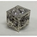 A heavy chased silver hinged box decorated with flowers. Approx. 35 grams. Est. £20 - £30.