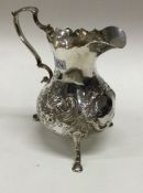 A fine Victorian silver crested jug. London 1857. By William Samuel Norman. Approx.97 grams. Est. £